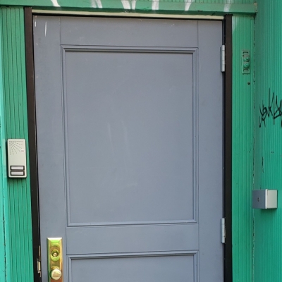 918 Manhattan Ave Brooklyn, NY - Fire Rated Two Panel Door with Steel Angle Frame.