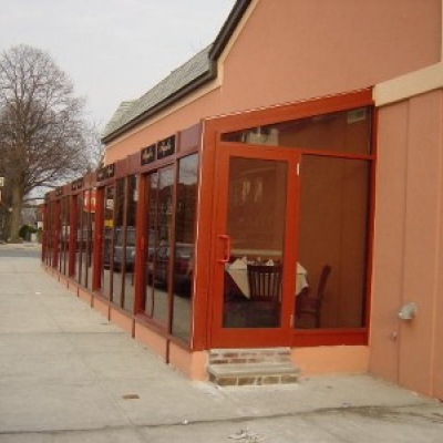 Main St 69th Ave, Flushing, NY - Restaurant extension Red painted Aluminum Glass Enclosure