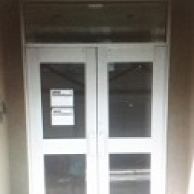 Pair of Medium Style Clear Anodized Aluminum doors with Transom