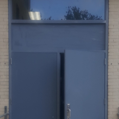 Pair of doors with steel/glass transom.