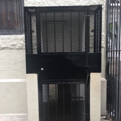 Custom swing out gate with two (2) sides and return.